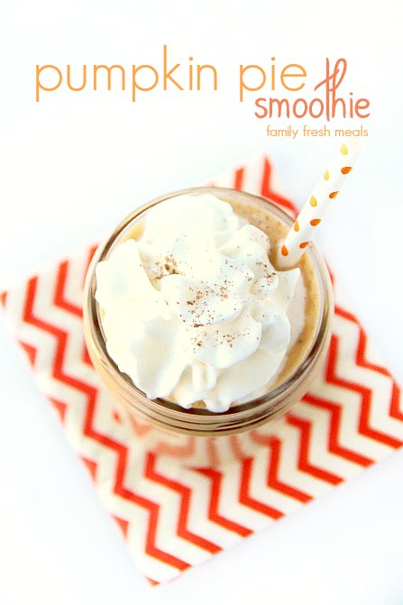 Pumpkin Pie Smoothie in a glass cup with a straw