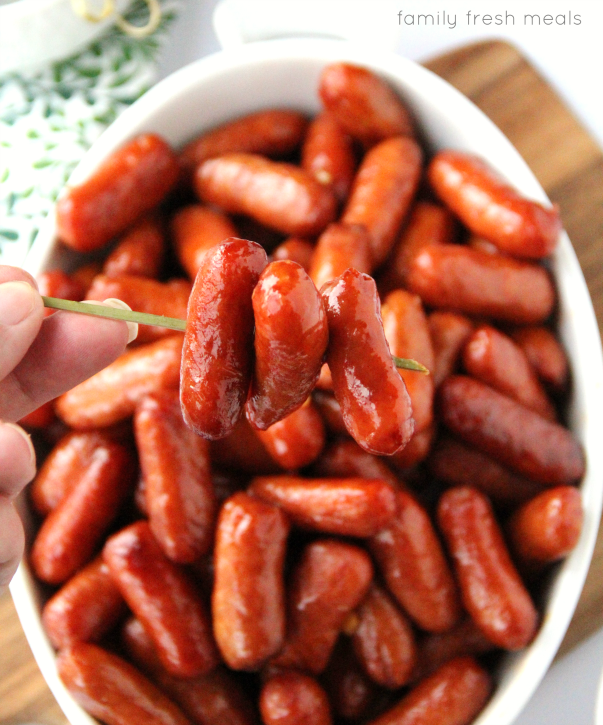 Crockpot Honey Garlic Little Smokies Sausages - appetizer served on a toothpick