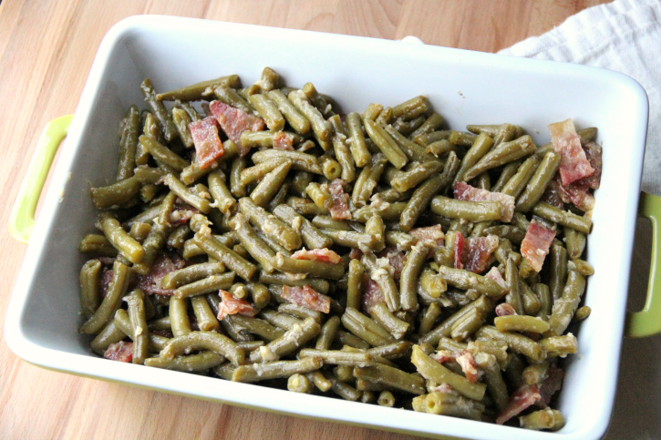 Smothered Bacon Green Bean Casserole in a casserole dish