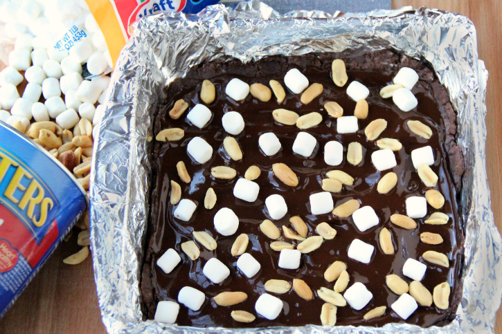 mini marshmallows and nuts added to top of fudge 