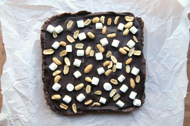 Easy Rocky Road Fudge sitting on parchment paper