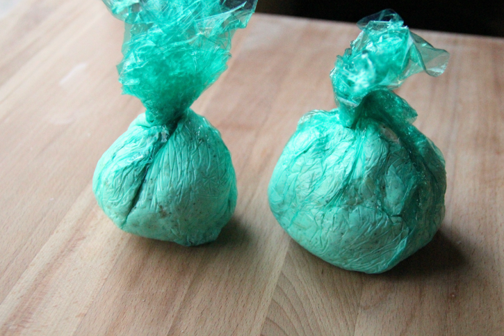 How to make a cheese ball, cheese mixture wrapped in cling wrap