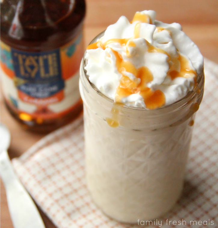 Salted Caramel Smoothie served in a glass with whipped cream and caramel