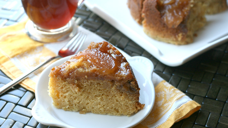 Slice of Slow Cooker Apple Crisp Cake on a white plate