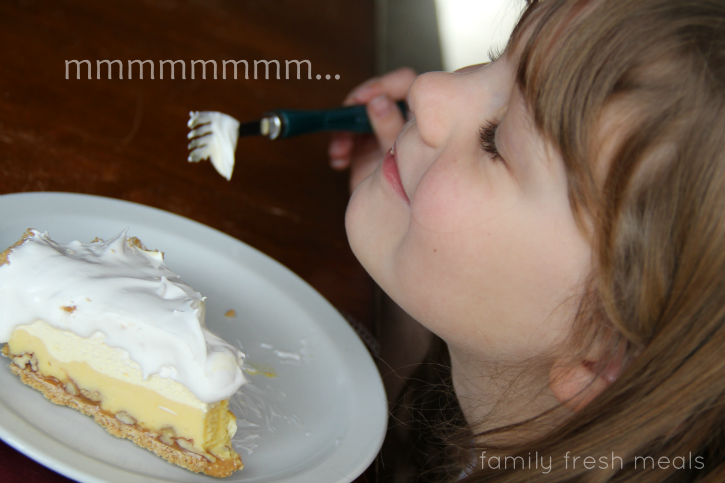 child eating pie with "Mmmmmm" on the image