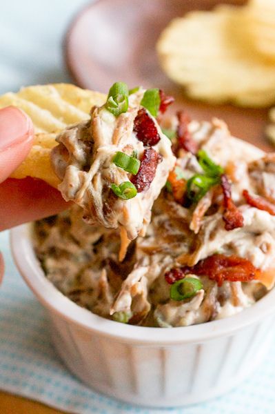 30 Easy Appetizers People LOVE - SCALLION AND CARAMELIZED ONION DIP in a small bowl with chips