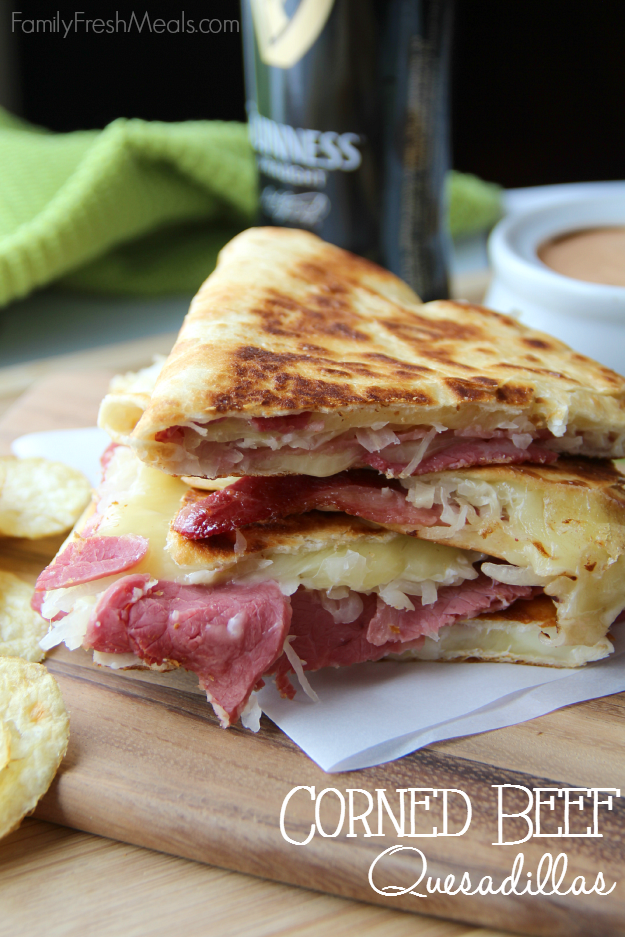 Corned Beef And Cabbage Quesadillas stacked on a cutting board