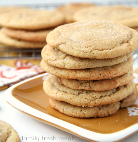 Stack of Soft and Chewy Caramel Filled Snickerdoodle Cookies on a brown plate
