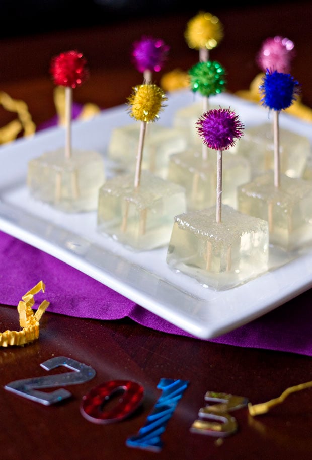 30 Easy Appetizers people LOVE - Champagne jello shots on a white plate