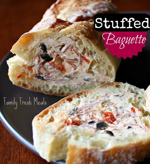 30 Easy Appetizers People LOVE - Stuffed Baguette on a black plate