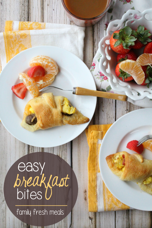 Breakfast Bites served on white plates with fresh fruit