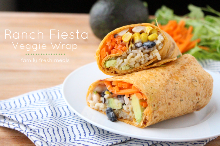 Easy Ranch Fiesta Veggie Wrap cut in half and stacked on a white plate