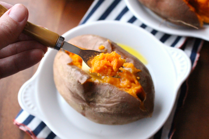 fork scooping up some sweet potato