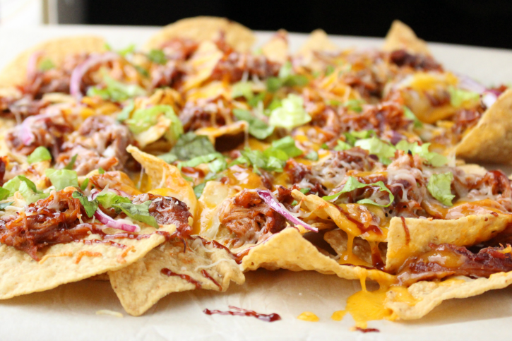 Pulled Pork Nachos on a baking sheet