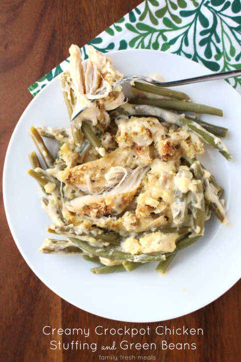 Creamy Crockpot Chicken Stuffing and Green Beans - served on a white plate