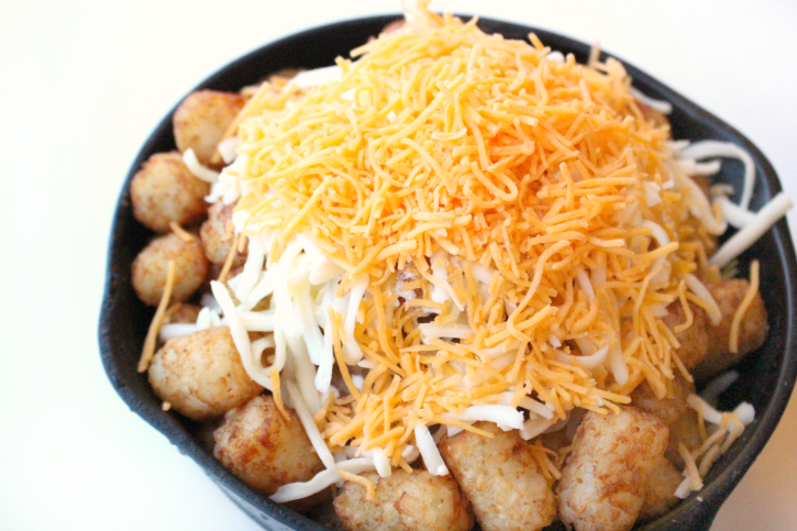 Tater Tots topped with shredded cheese