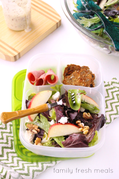 apple walnut goat cheese salad packed for lunch in a lunch box