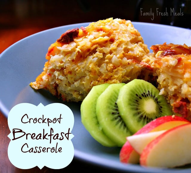 a serving of Crockpot Breakfast Casserole on a plate with fruit