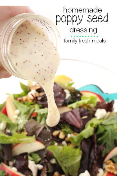 Poppy Seed Dressing being poured on a salad