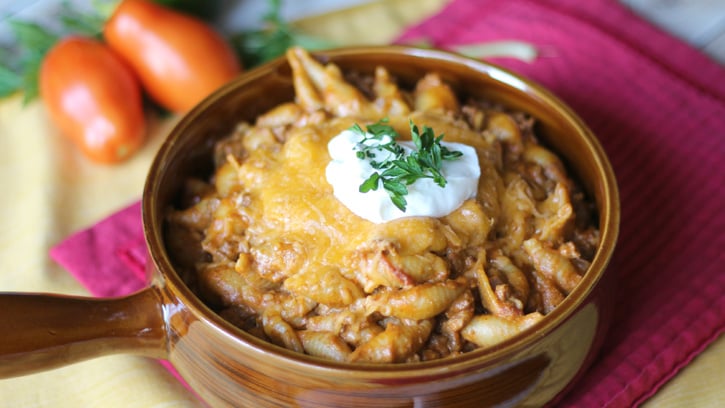 Slow Cooker Taco Pasta in a brown bowl