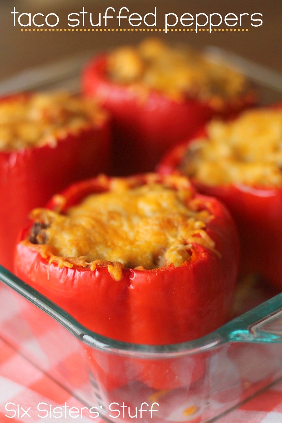 Taco Stuffed Peppers in a glass baking dish