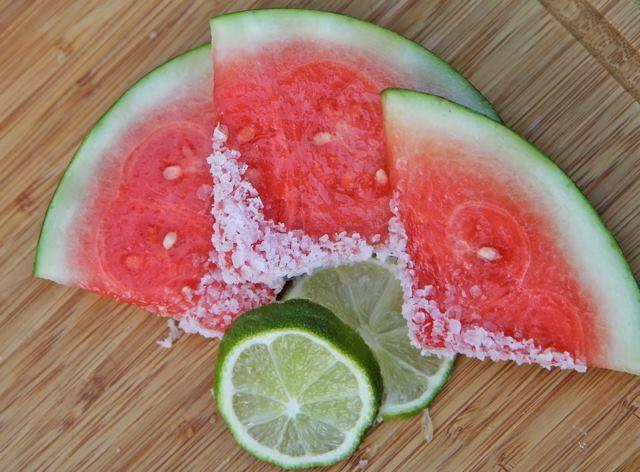 Three slices of watermelon with salt on the ends