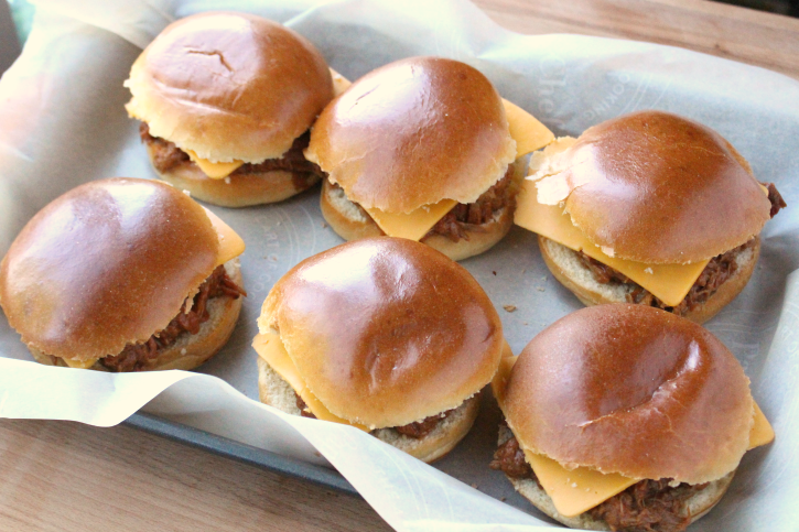 Baked BBQ Pork Sandwiches on a baking sheet