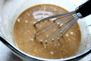 mixing gravy mixture in a bowl