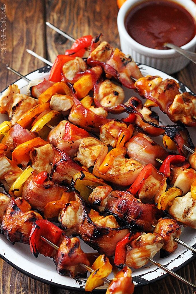 GRILLED HONEY BBQ BACON CHICKEN KABOBS on a white plate