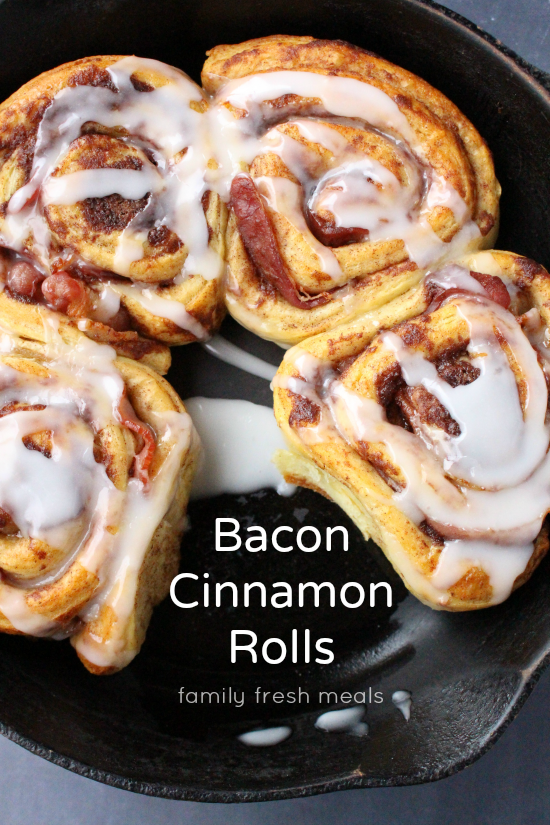 Bacon Wrapped Cinnamon Rolls in a cast iron skillet