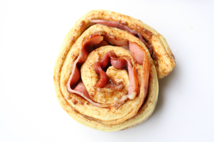 Bacon Wrapped Cinnamon Roll on a plate