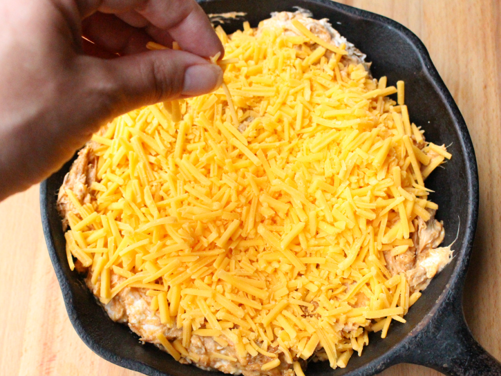 topping dip with shredded cheese