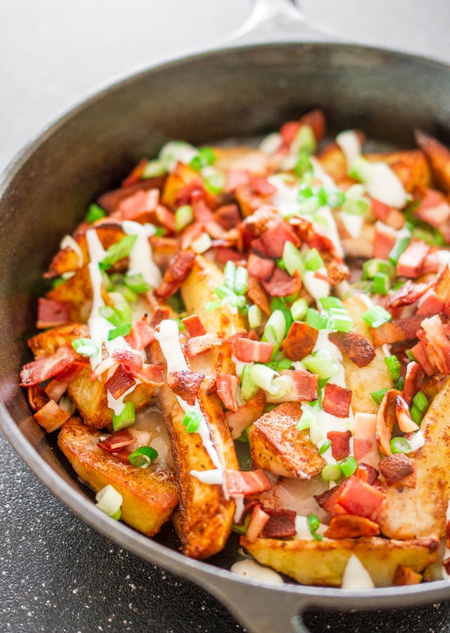 loaded pub fries  in a skillet