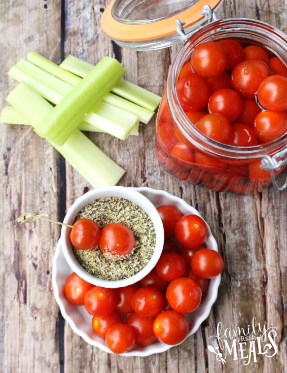 Boozy Bloody Mary Tomato Bombs in a glass jar and in a dish 