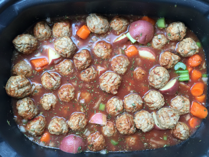Easy Slow Cooker Stew cooking in a Crockpot