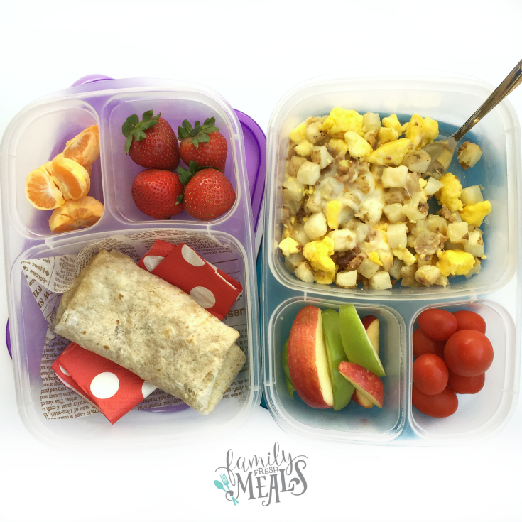 2 lunchboxes packed with a breakfast foods and fruit