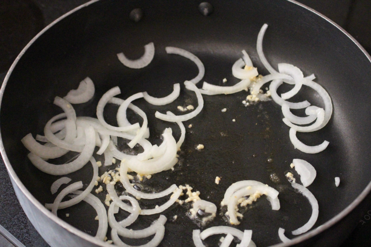 Saute onions and garlic in a pan 