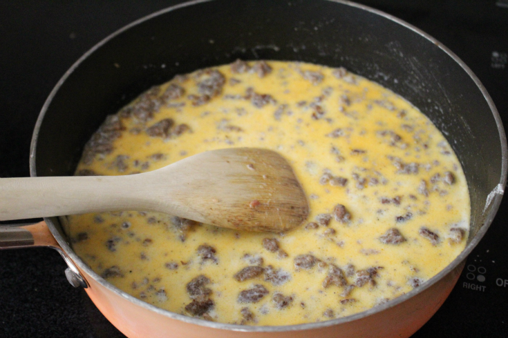 Biscuits and Gravy Breakfast Casserole - Creamy mixed into sausage mixture