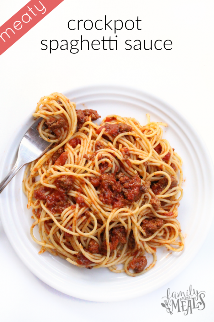 spaghetti and meat sauce on a plate with a fork