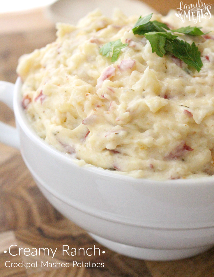 Creamy Ranch Crockpot Mashed Potatoes in a white bowl