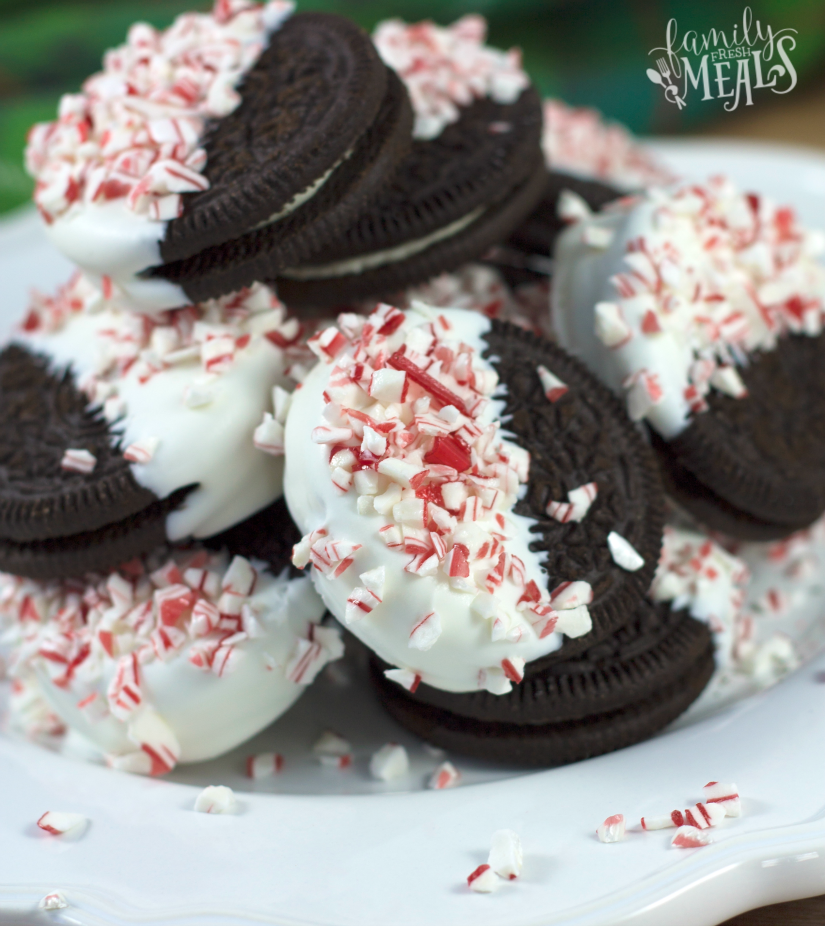 Peppermint Bark Oreos stacked on a plate