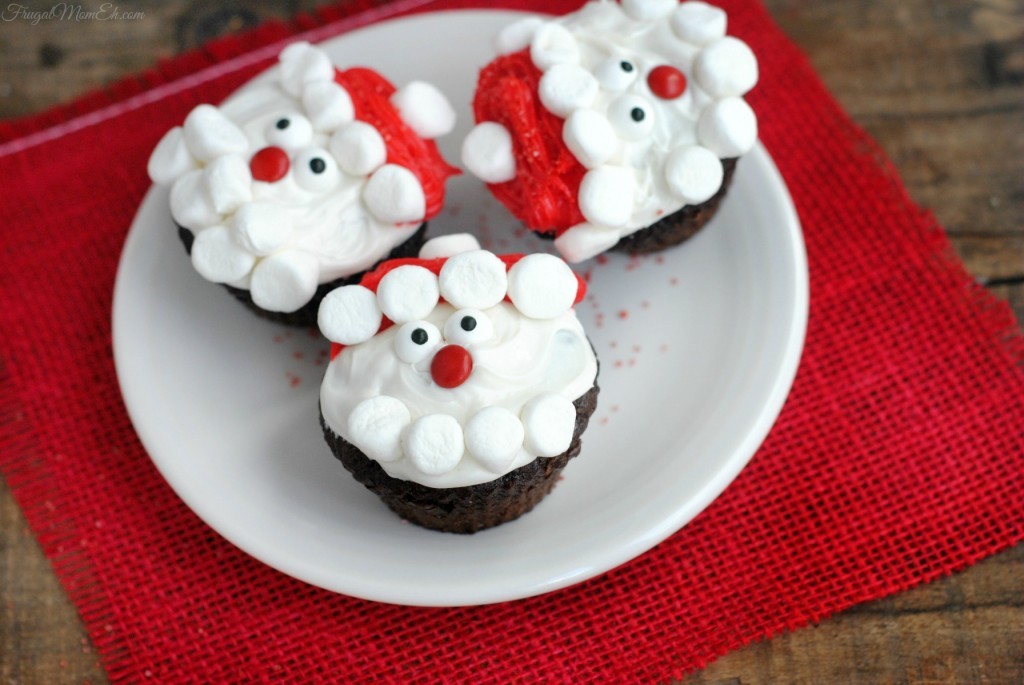 3 santa cupcakes on plate