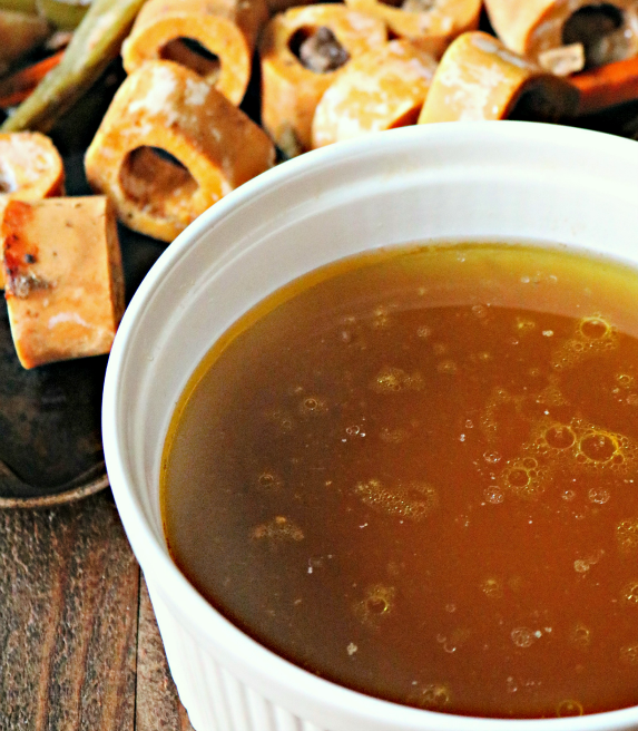 Healthy crockpot broth served in a small white bowl