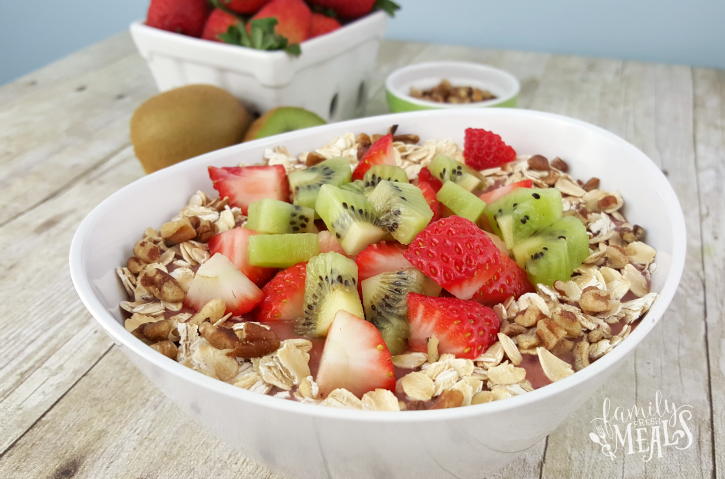 Very Berry Kiwi Smoothie Bowl served in a white bowl