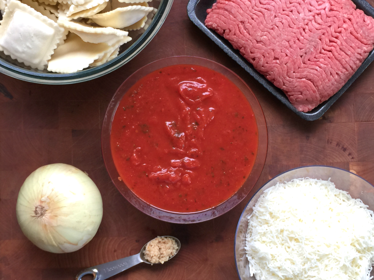 Easy Crockpot Lasagna Ravioli - pasta sauce, raviolis, ground beef, cheese, onion and garlic