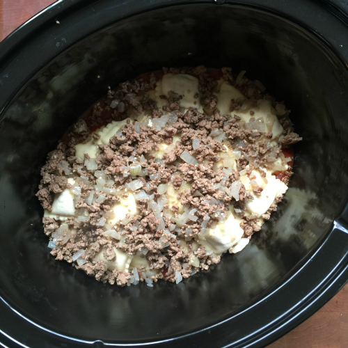 Easy Crockpot Lasagna Ravioli - Ground beef and onions added to slow cooker