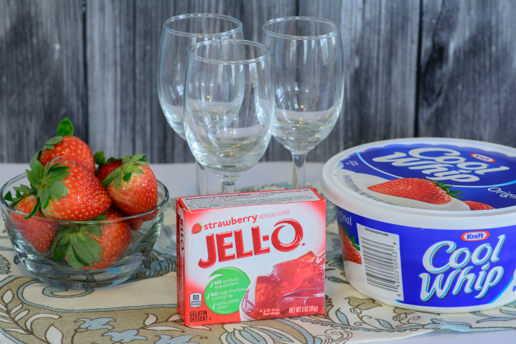 ingredients for jello parfaits and 3 glasses on a table