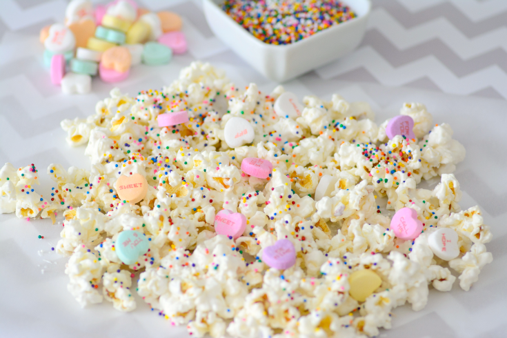 Valentine's Day Popcorn spread out on parchment paper