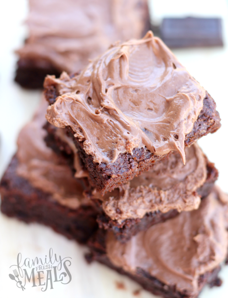 Homemade Chocolate Fudge Brownies with Nutella Frosting stacked on a plate