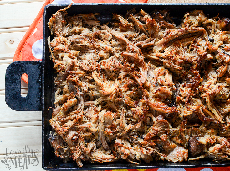 Crockpot Pork Carnitas - Slow Cooker Pork Recipe browned on a baking sheet